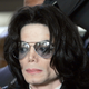 Michael Jackson prepares to enter the Santa Barbara County Superior Court to hear the verdict read in his child molestation case June 13, 2005 in Santa Maria, California. After seven days of deliberation the jury has reached a not guilty verdict on all 10 counts in the trial against Michael Jackson. Jackson was charged in a 10-count indictment with molesting a boy, plying him with liquor and conspiring to commit child abduction, false imprisonment and extortion. He pleaded innocent.